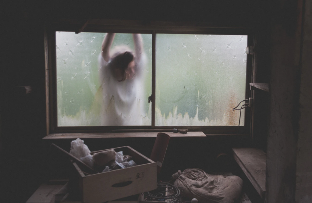 woman outside the window